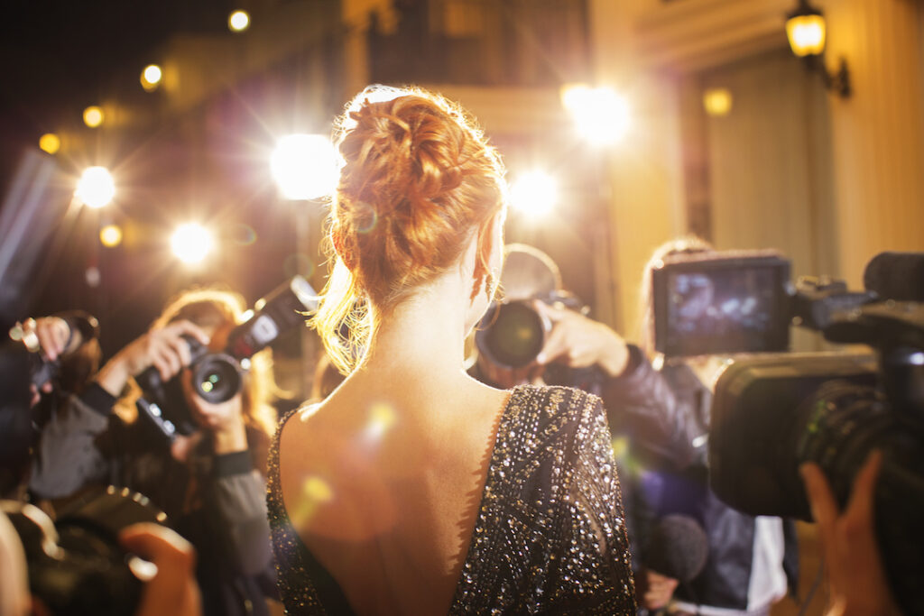 "Celebrity" with paparazzi